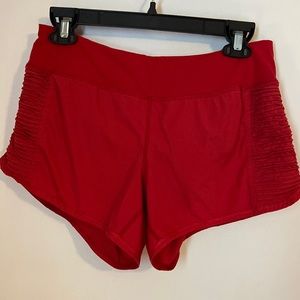 Red Lululemon shorts